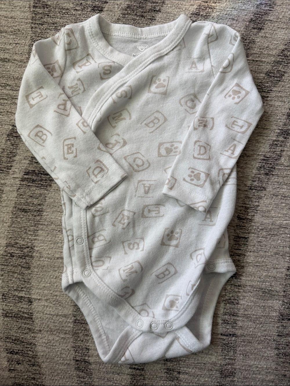 Koala Kids White One-Piece with Beige Alphabet Print